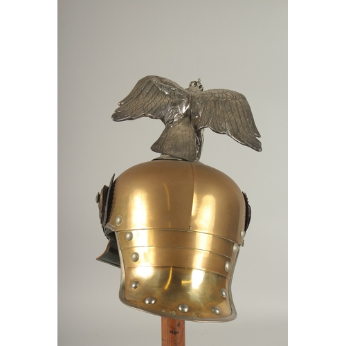 797 - A LARGE PRUSSIAN BRASS AND LEATHER GARDE DE CORPS HELMET, with a large eagle badge MIT. GOTT. FUR. K... 