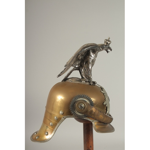 797 - A LARGE PRUSSIAN BRASS AND LEATHER GARDE DE CORPS HELMET, with a large eagle badge MIT. GOTT. FUR. K... 