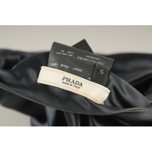 808 - A PRADA BLACK SILK HAT, boxed.