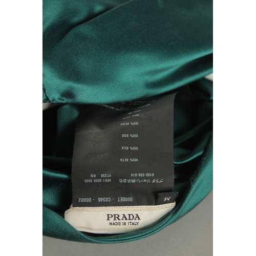 809 - A PRADA GREEN SILK HAT, boxed.