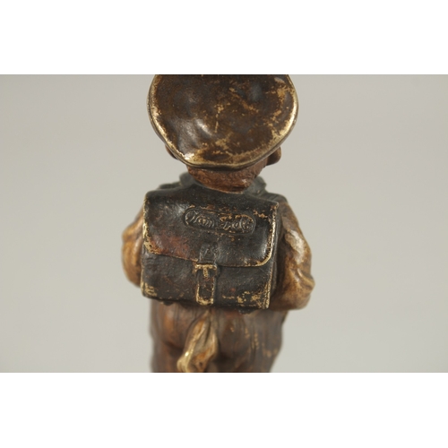 834 - A RARE BERGMANN BRONZE LIGHTER as a small Dutch boy smoking a cheroot and standing on a circular mar... 