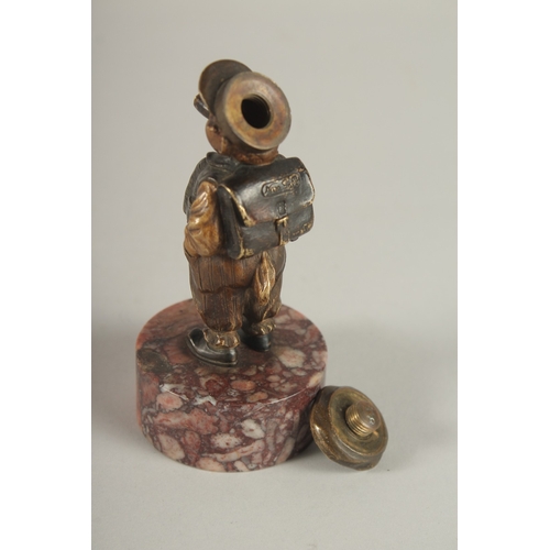 834 - A RARE BERGMANN BRONZE LIGHTER as a small Dutch boy smoking a cheroot and standing on a circular mar... 