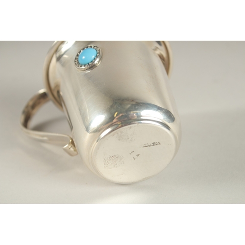 844 - A SERKOS SILVER CUP with a turquoise stone, boxed. 51grms.