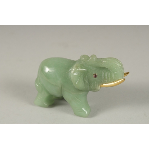 875 - A RUSSIAN CARVED JADE ELEPHANT with silver gilt tusks and stone eyes. Maker H. W. Faberge, in a fitt... 