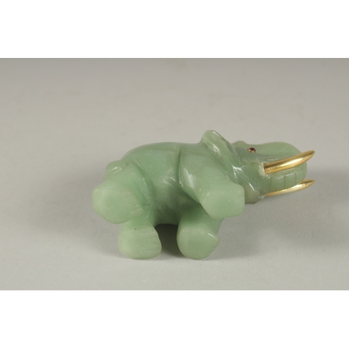 875 - A RUSSIAN CARVED JADE ELEPHANT with silver gilt tusks and stone eyes. Maker H. W. Faberge, in a fitt... 