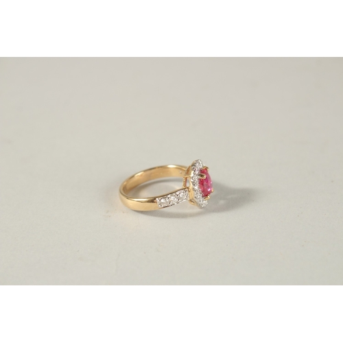 980 - AN 18CT YELLOW GOLD, RUBY AND DIAMOND OVAL CLUSTER RING, natural unheated ruby.