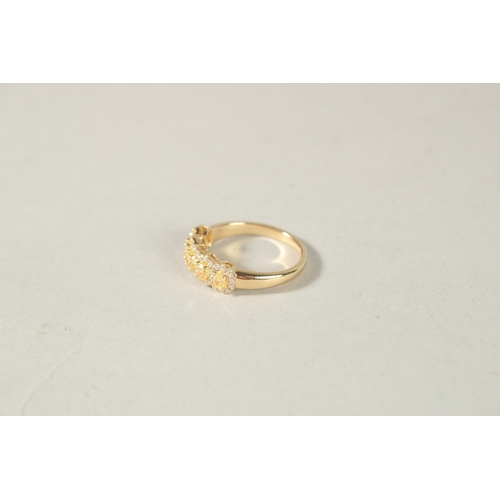 983 - AN 18CT YELLOW GOLD AND NATURAL YELLOW AND WHITE DIAMOND RING.