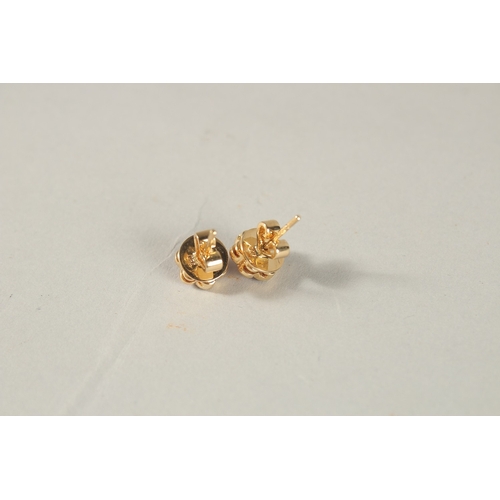 987 - A PAIR OF 18CT YELLOW GOLD, RUBY AND DIAMOND FLOWER HEAD CLUSTER EAR STUDS.