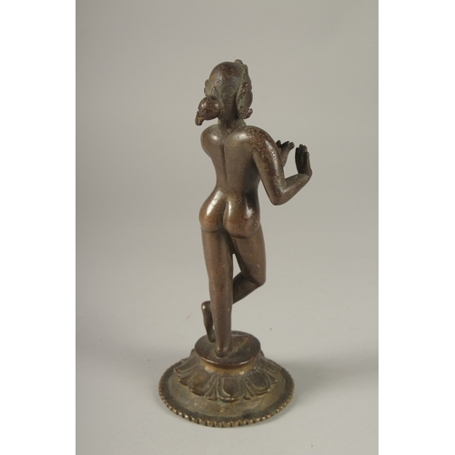 106 - A RARE LARGE 16TH CENTURY OR EARLIER INDIAN BRONZE FIGURE OF FLUTING KRISHNA, (the base possibly 18t... 