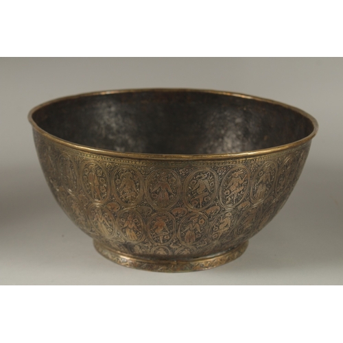 110 - A FINELY ENGRAVED 19TH CENTURY PERSIAN QAJAR BRASS BOWL, 25cm diameter.