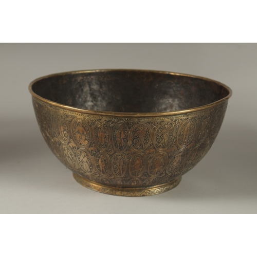 110 - A FINELY ENGRAVED 19TH CENTURY PERSIAN QAJAR BRASS BOWL, 25cm diameter.