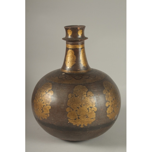 122 - A RARE LARGE 18TH-19TH CENTURY MUGHAL INDIAN PAINTED AND POLYCHROMED POTTERY BOTTLE, 33cm high.