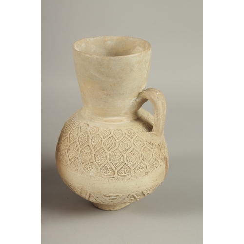 123 - TWO 12TH-13TH CENTURY SELJUK ANAATOLIAN UNGLAZED POTTERY JUGS, one signed, made by Rafi, largest 22c... 