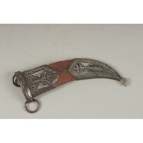 129 - A 19TH CENTURY OTTOMAN HORN HILTED DAGGER, with silver inlaid steel mounted scabbard, 28cm long.