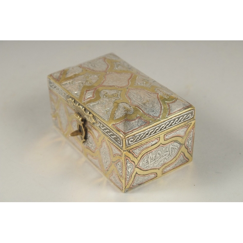 132 - A FINE 19TH CENTURY DAMASCUS SILVER AND COPPER INLAID BRASS BOX, 10cm across.