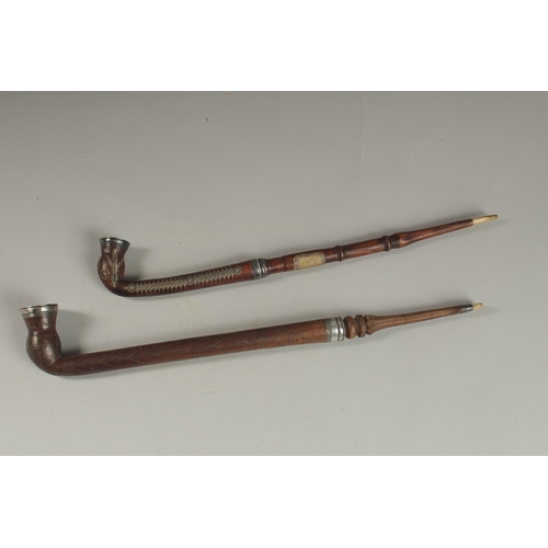 136 - TWO FINE OTTOMAN TURKISH SILVER AND BRASS INLAID WOODEN SMOKING PIPES, longest 43cm long, (2).