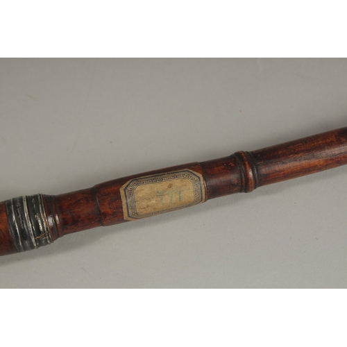 136 - TWO FINE OTTOMAN TURKISH SILVER AND BRASS INLAID WOODEN SMOKING PIPES, longest 43cm long, (2).