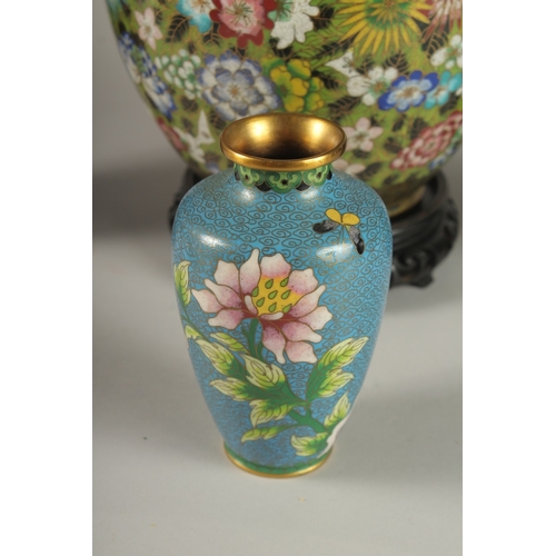 14 - A GOOD COLLECTION OF CLOISONNE ENAMELLED VASES, including a fine pair of vases (one af), and a flora... 