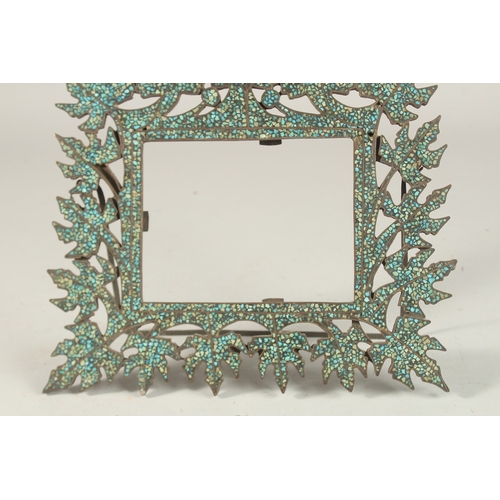 143 - A FINE 19TH CENTURY INDIAN POSSIBLY KASHMIR TURQUOISE INLAID FRAME, 26cm wide.