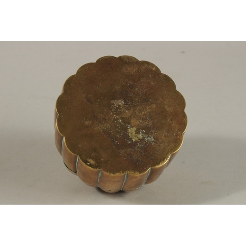 148 - A 19TH CENTURY MUGHAL INDIAN DOMED BRASS PANDAN BOX, 12cm high.