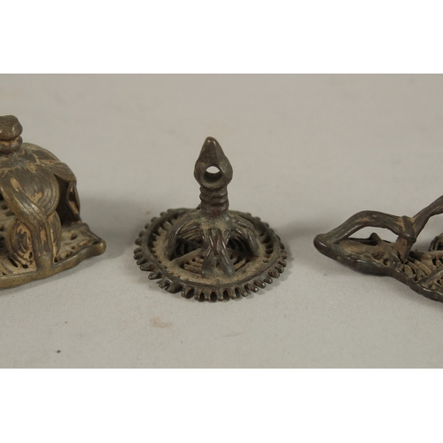 150 - A GROUP OF FIVE 17TH CENTURY TIBETAN OR SOUTH INDIAN BUDDHIST BRONZE STAMPS, (5).