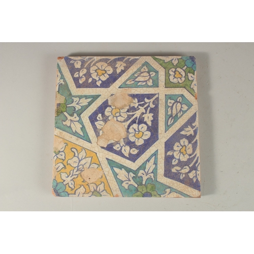 157 - A FINE 18TH-19TH CENTURY INDIAN MULTAN TILE, with geometric designs, 23cm x 23cm.