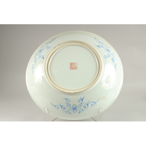 16 - A LARGE CHINESE MILLEFLEUR PORCELAIN CHARGER, the base with character mark in red, 40cm diameter.