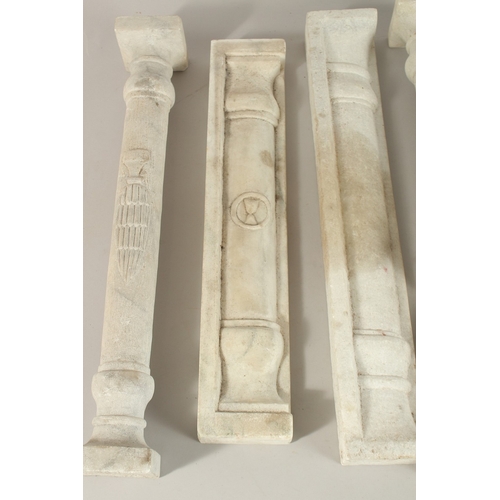 168 - A COLLECTION OF SEVEN ISLAMIC MAMLUK STYLE CARVED MARBLE PILLARS, some with Mamluk cup symbols, (7).