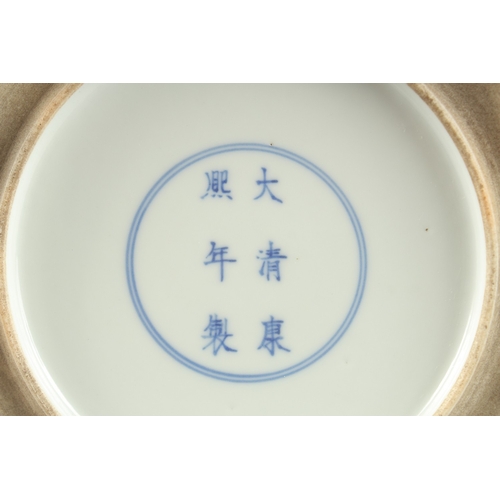 17 - A CHINESE FAMILLE VERTE PORCELAIN DRAGON DISH, base with character mark, 28cm diameter.