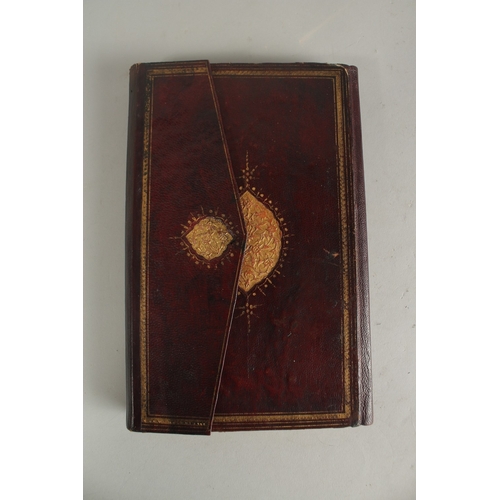 172 - A FINE 19TH CENTURY OTTOMAN LEATHER BOUND MANUSCRIPT, signed Mustafa Rasikh, 23.5cm x 14.5cm.