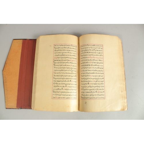 172 - A FINE 19TH CENTURY OTTOMAN LEATHER BOUND MANUSCRIPT, signed Mustafa Rasikh, 23.5cm x 14.5cm.