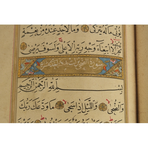 173 - A FINE 17TH CENTURY OTTOMAN LEATHER BOUND QURAN JUZ SECTION, with beautifully gilded illuminated sur... 