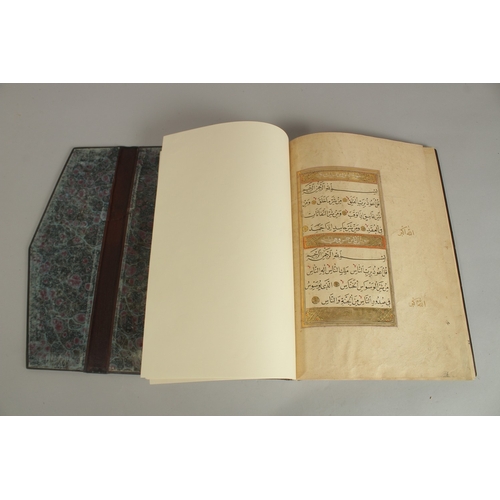 173 - A FINE 17TH CENTURY OTTOMAN LEATHER BOUND QURAN JUZ SECTION, with beautifully gilded illuminated sur... 