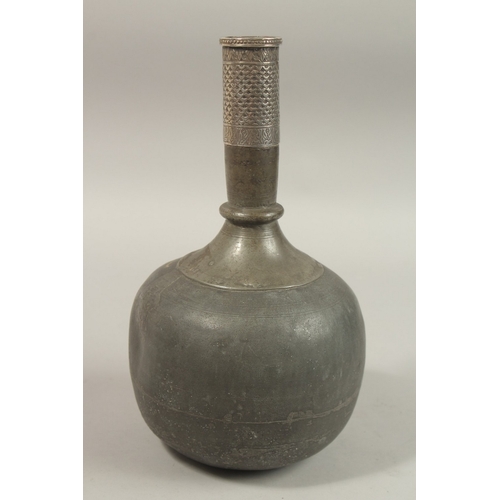 176 - A RARE 18TH CENTURY MUGHAL INDIAN SILVER MOUNTED LEAD SURAHI BOTTLE, 30cm high.