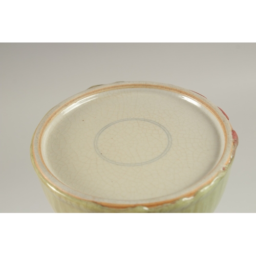 18 - A CHINESE GREEN GLAZED PORCELAIN DOMED INK POT, 13.5cm diameter.