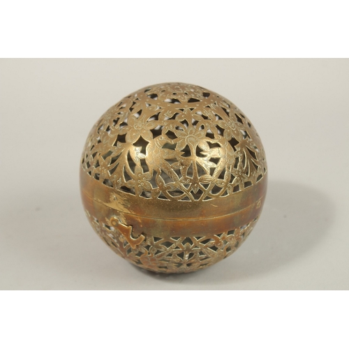 188 - A FINE EARLY 19TH CENTURY MUGHAL NORTH INDIAN OPENWORKED BRASS HAND WARMER, with birds and flower de... 