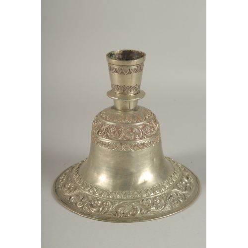 201 - A 19TH CENTURY INDIAN SILVER HUQQA BASE, with bands of embossed and chased foliate decoration, 19cm ... 