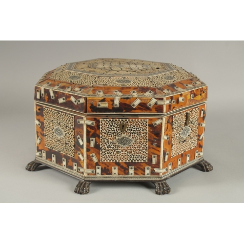 202 - A 19TH CENTURY ANGLO INDIAN TORTOISESHELL, BONE AND PENWORK OCTAGONAL SEWING BOX, 33cm at widest poi... 