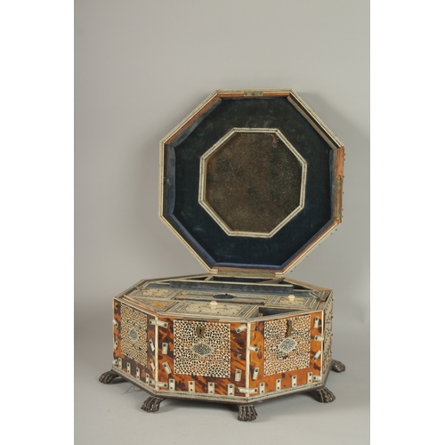 202 - A 19TH CENTURY ANGLO INDIAN TORTOISESHELL, BONE AND PENWORK OCTAGONAL SEWING BOX, 33cm at widest poi... 