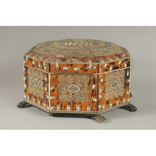 202 - A 19TH CENTURY ANGLO INDIAN TORTOISESHELL, BONE AND PENWORK OCTAGONAL SEWING BOX, 33cm at widest poi... 