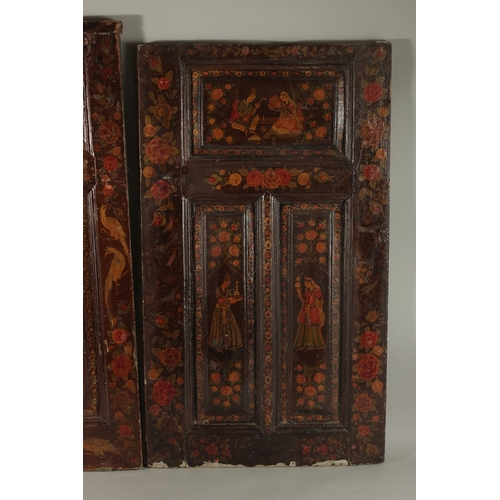 210 - TWO 19TH CENTURY PERSIAN QAJAR LACQUERED WOODEN DOORS, painted with various figures as well as birds... 