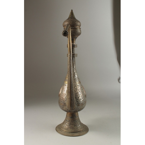 216 - A VERY FINE AND LARGE 19TH CENTURY SYRIAN DAMASCUS SILVER AND COPPER INLAID BRASS EWER, with calligr... 