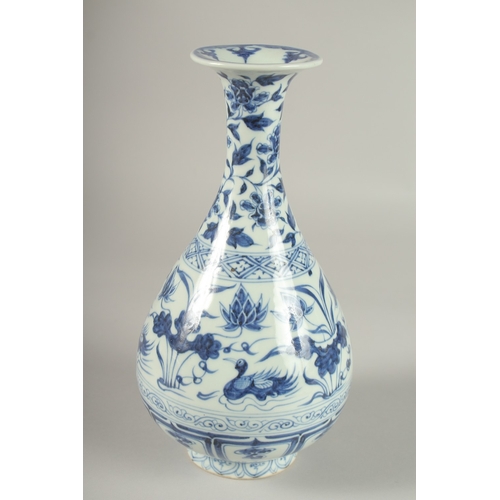 23 - A CHINESE BLUE AND WHITE PORCELAIN VASES, painted with ducks and lotus, 27cm high.