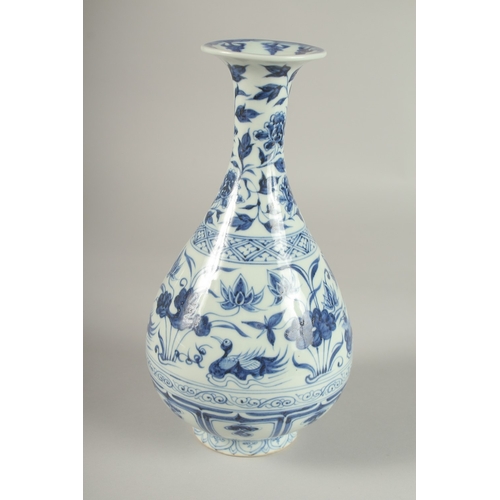 23 - A CHINESE BLUE AND WHITE PORCELAIN VASES, painted with ducks and lotus, 27cm high.