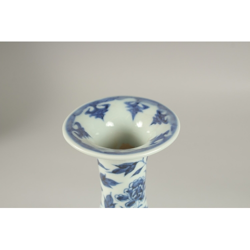 23 - A CHINESE BLUE AND WHITE PORCELAIN VASES, painted with ducks and lotus, 27cm high.