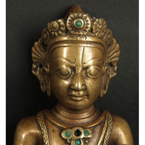 231 - A VERY FINE LARGE 17TH-18TH CENTURY TIBETAN BRONZE FIGURE OF A MALE DEITY, inlaid with turquoise sto... 