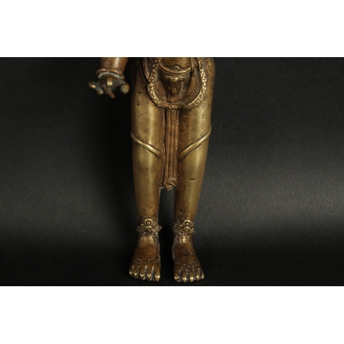 231 - A VERY FINE LARGE 17TH-18TH CENTURY TIBETAN BRONZE FIGURE OF A MALE DEITY, inlaid with turquoise sto... 