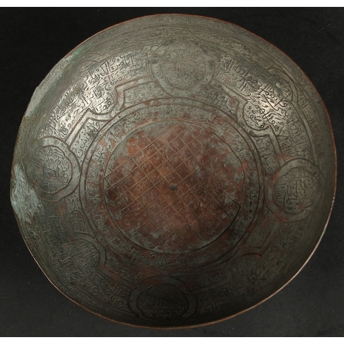 235 - A FINE18TH-19TH CENTURY PERSIAN QAJAR TINNED COPPER CALLIGRAPHIC MAGIC BOWL, 18.5cm wide.