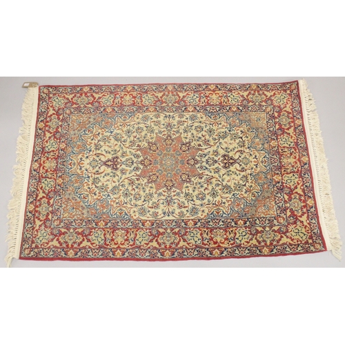 239 - A VERY FINE EARLY 20TH CENTURY PERSIAN ISFAHAN RUG, 159cm x 103cm.