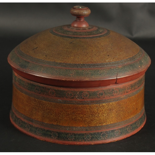 242 - AN EARLY 19TH CENTURY INDIAN LACQUERED WOODEN TURBAN BOX, 24cm wide.